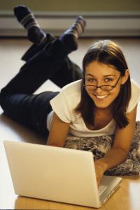 Female student looking at a computer