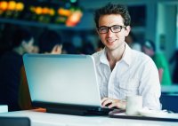 Young man in front of laptop