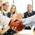 Business associates shaking hands