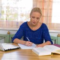 Female student at home doing online coursework