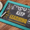 Keep learning written on a chalkboard