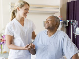 Medical assistant with a patient