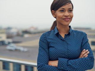 Businesswoman staring off into distance